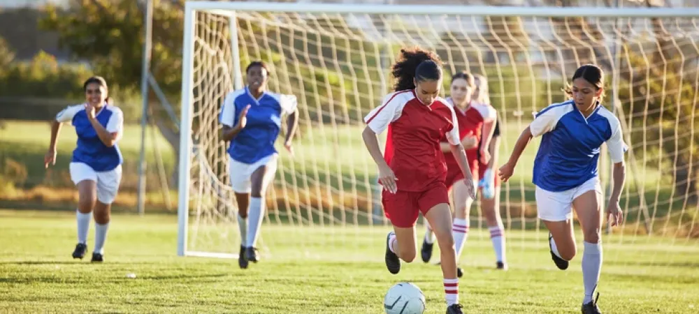 Girls playing soccer