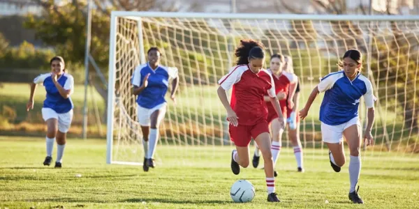 Girls playing soccer